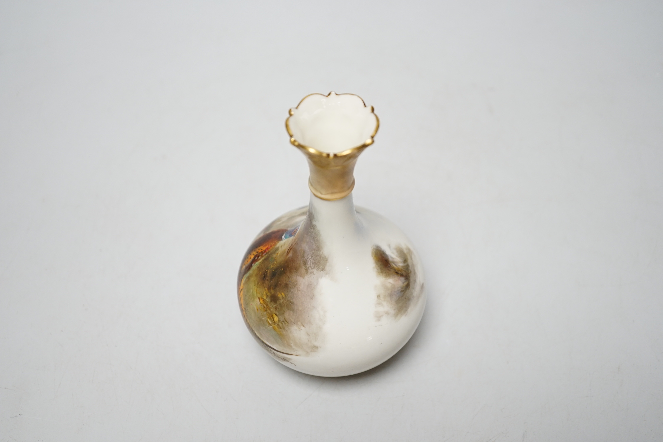 A Royal Worcester painted porcelain ‘pheasant’ vase, model number 702, signed 702